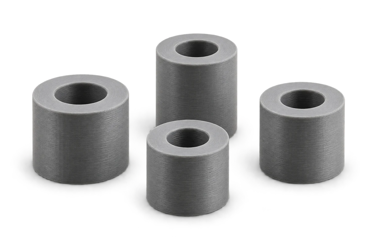 Illustrative group of four grey printed spacers.